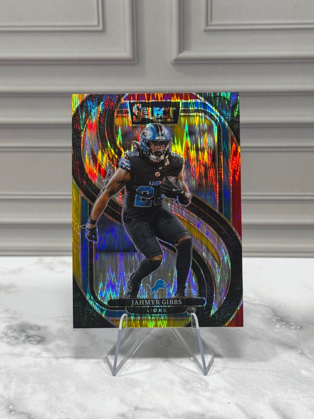 2024 Panini Select - Premier Level Jahmyr Gibbs #163 Red & Yellow Shock Prizm
