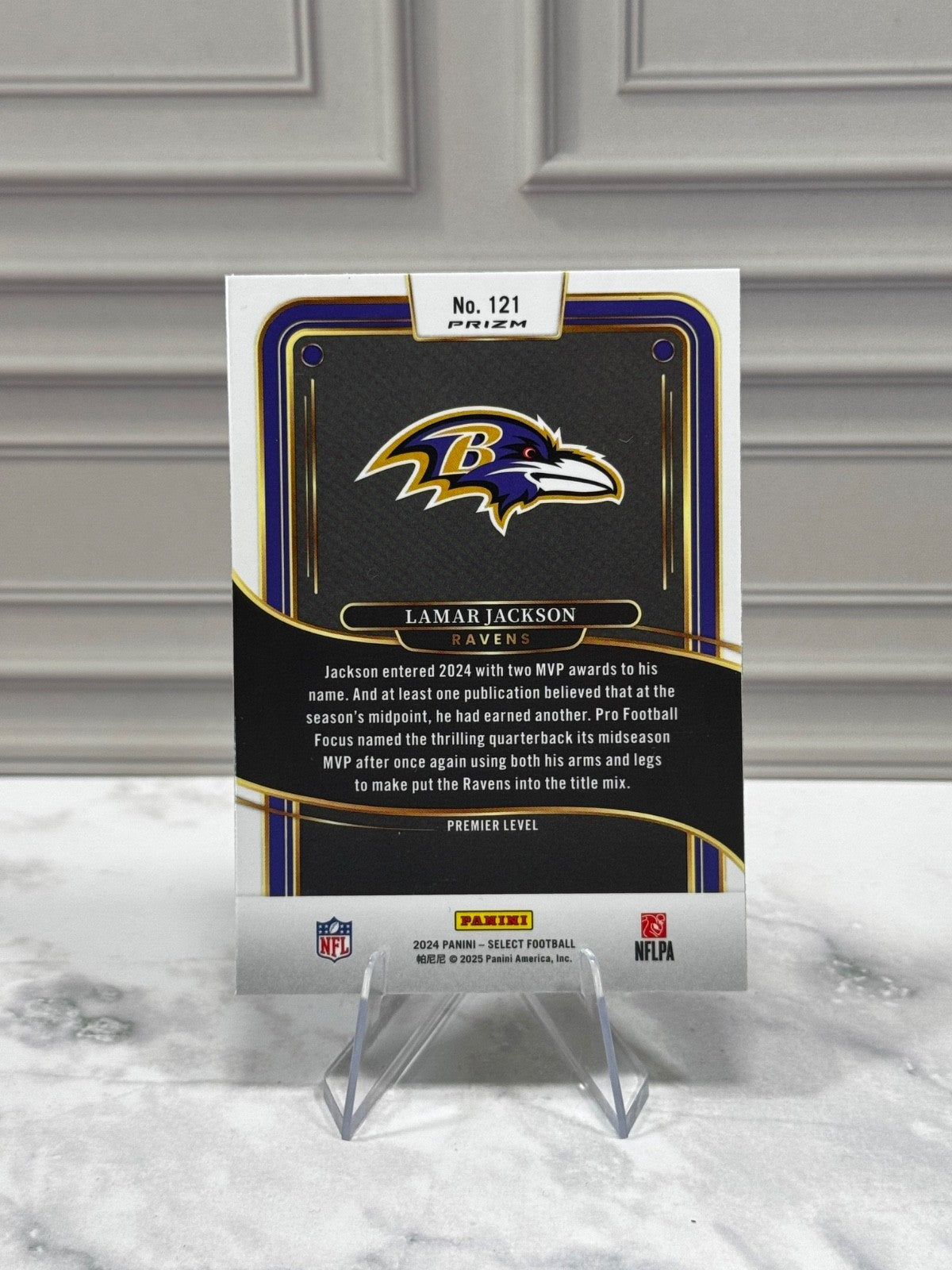 2024 Panini Select - Premier Level Lamar Jackson #121 Red & Yellow Shock Prizm